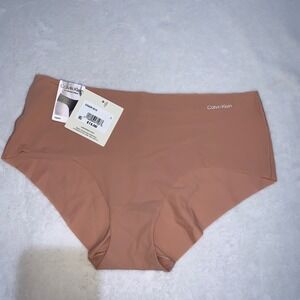 Calvin Klein nude beige invisibles briefs panties size large new with tags silky